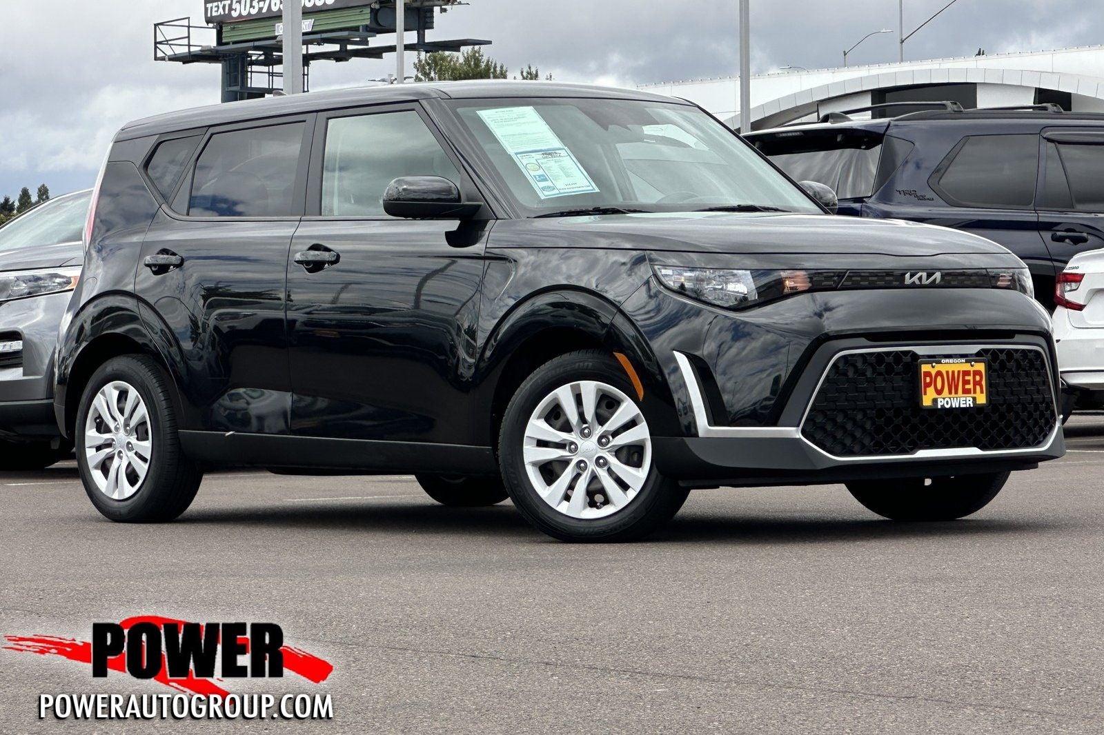 2023 Kia Soul LX in Fusion Black — front three-quarter view